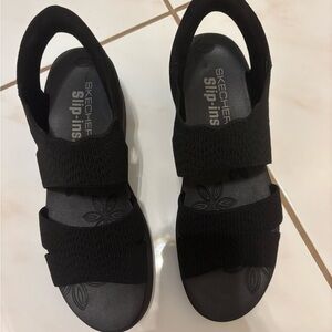 Woman’s Sketchers Slip-on Sandals